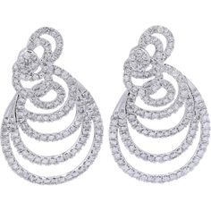 Embrace the elegance of timeless sophistication with the 14K White Gold 7 Carat Total Weight Diamond Spiral Statement Earrings.Crafted to capture attention and ignite admiration, these earrings exude opulence and grace. Each dazzling diamond, totaling an impressive 7 carats, is meticulously set within a captivating spiral design, creating an aura of luxury and allure. The brilliance of the diamonds is further enhanced by the luminosity of the 14K white gold, adding a touch of glamour to any ensemble.These statement earrings are more than just accessories; they are symbols of refined taste and unmatched beauty. Whether worn for a special occasion or to elevate everyday glamour, they effortlessly exude confidence and sophistication. Let these exquisite earrings be a testament to your impecca Luxury White Gold Diamond Chandelier Earrings, Luxury Art Deco White Gold Diamond Earrings, Elegant Spiral Jewelry For Formal Occasions, Formal Round Diamond Earrings With Elegant Design, Elegant White Gold Spiral Earrings, White Diamond Earrings With Halo Design For Evening, Formal Spiral Diamond Jewelry, Elegant Swirl Shaped Wedding Jewelry, Elegant Swirl Earrings