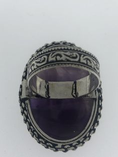 Large genuine amethyst Vintage ring Low content silver not sterling. Size 8 Can be resized by my jeweler for $15-$20 All rings are shipped free in the US in a nice gift box. Check out our over a THOUSAND great reviews Engraving is $4 per letter and is not always perfect depending on the piece. It can take a few days if the jeweler is busy. This is payable to Paypal Judithsltd@gmail.com Antique Purple Rings As Gift, Antique Purple Rings For Gift, Spiritual Stamped 925 Amethyst Ring, Purple Hallmarked Amethyst Ring For Gift, Spiritual Oval Amethyst Ring With Stone Setting, Purple Amethyst Ring Stamped 925 For Gift, Purple Amethyst Ring Stamped 925 As A Gift, Antique Silver Amethyst Gemstone Ring, Sterling Silver Cabochon Amethyst Ring Gift