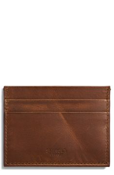 Slim and sleek, this Italian-leather case features five slots to keep your cards organized in handsome style. 4"W x 3"H Leather Made in Italy Leather Business Card Holder With Interior Slots, Classic Brown Card Holder For Travel, Classic Brown Wallet For Everyday Use, Classic Business Card Holder With Coin Pocket, Classic Brown Travel Card Holder, Classic Cognac Card Holder With Card Slots, Classic Wallets For Everyday Use, Classic Wallets With Card Slots, Classic Card Holder With Coin Pocket