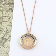 "A 1941 (80th birthday) or 1951 (70th birthday) farthing coin locket necklace in rose gold - a fabulous keepsake for anyone celebrating one of these major milestones. PLEASE READ THIS VERY IMPORTANT INFORMATION: US / CANADA / AUSTRALIA / Other NON-European countries: Etsy say 3-7 days Royal Mail (UK postal service) . This is unrealistic. It takes about a week not less. HOWEVER my experience is that 15 % of the time it can take up to 3 weeks and very occasionally up to 2 months. I ask that when y Anniversary Rose Gold Necklace With Vintage Charm, Anniversary Rose Gold Locket Necklace With Round Pendant, Rose Gold Locket Necklace For Anniversary With Round Pendant, Rose Gold Locket Necklace For Anniversary, Rose Gold Medallion Charm Necklaces For Anniversary, Birthday Rose Gold, Birthday Accessories, Birthday Roses, Special Birthday Gifts