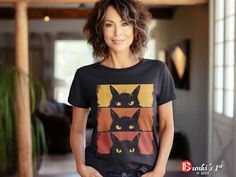 Embrace the charm of grumpy cats with this delightful and funny Cat Lover, Grumpy Black Kitten, Cat Mom, Cat Dad T-Shirt, perfect for all feline enthusiasts. A unique gift for cat moms and dads for any occasion. This eye-catching design features a black cat on a beige shaded background, adding a pop of color to your style. Available for toddlers, kids, and adults, this t-shirt comes in a variety of sizes to suit everyone in the family. Get ready for Halloween with the matching hoodie, featuring Funny Black T-shirt With Cat Design, Funny Black Top With Cat Design, Funny Black Cat Design Top, Black Short Sleeve Top With Cat Design, Kitten Black, Cat Mom Shirt, Cat Mom Shirts, Black Kitten, Cat Tee