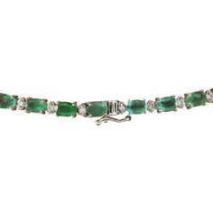 Stamped: 14KTotal Necklace Weight: 27 GramsNecklace Length: 18.5 InchesCenter Emerald Weight: 2.22 Carat (11.00x8.00 Millimeters)Side Emerald weight: 22.62 Carat (6.00x4.00 Millimeters)Diamond Weight: 2.32 Carat (F-G Color, VS2-SI1 Clarity) Face Measures: 17.40x16.05 MillimetersSKU: [600755] Luxury Emerald Gemstone Necklace For Formal Occasions, Luxury Oval Necklace With Prong Setting, Formal Emerald Necklace With Diamond Cut, Elegant Baguette Cut Emerald Necklace For Formal Occasions, Elegant Baguette Cut Emerald Necklace For Formal Events, Elegant Formal Baguette-cut Emerald Necklace, Formal Single Strand Emerald Necklace, Formal White Gold Emerald Necklace, Classic Diamond Cut Emerald Necklace For Formal Occasions