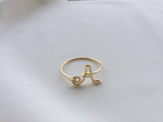 Custom Initial ring, gold initial jewelry, silver letter A ring, name ring, personalized ring, bridesmaid gift, wedding gift, birthday gift - Size US/UK US 2 ~ US 12 UK I ~ UK X pls leave us a note if you need other size. - Materials Gold/Silver plated brass. - It will be packed in a gift box. - Handmade time: 1-3 days( time from payment to shipment) Payment: Paypal. Jewelry with daily wear and bath is not returnable,refundable or replaceable. Electroplating materials are not like gold, silver a Adjustable Monogram Initial Ring For Weddings, Initial Ring For Wedding, Elegant Initial Ring For Personalized Gift, Minimalist Personalized Initial Ring For Wedding, Personalized Open Initial Ring For Wedding, Minimalist Monogram Initial Ring As Gift, Minimalist Rings With Initials For Personalized Gift, Elegant Gold Initial Ring For Personalized Gift, Elegant Initial Ring With Custom Name