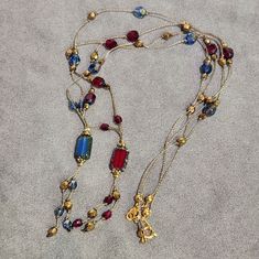 Beautiful "Marlene Vanbeek" Dainty Lariat Style 100% Silk & Frosted Faceted Glass Necklaces (2)! Color Shades Are: Blue, Red, And Gold. Silk Cord Is Brown. Faceted Glass Beads Vary In Shapes And Sizes! Clasps Are Goldtone. Necklaces Measure Approximately (19" & 20") In Length. Please See All Of The Photos For Details. Free Thank You Gift With Every Purchase! Make Up A "Bundle" To Save On Prices And High Shipping Costs! "Custom Orders Available On My Handmade Items! Feel Free To Message Me Any Ti Knotted Jewelry, Cord Necklaces, Silk Cord Necklace, Gold Beaded Necklace, Duo Beads, Jewelry Knots, Gold Bead Necklace, Gold Silk, Silk Cord