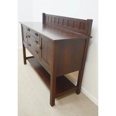 a wooden dresser with drawers in a room