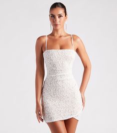 Look picture-perfect as the bride-to-be or graduate in this glitzy glitter lace short dress for rehearsal dinners and ceremonies! Crafted with a gorgeous sheer glitter lace fabric with a nude-tone lining for coverage, this dress radiates chic glamour. The bodice is shaped with a sleeveless square neckline with adjustable spaghetti straps so you can find your perfect fit. The high waist seam is accented with ruching, leading to a faux wrap-front design creating an asymmetric mini-length hem. The Homecoming Dresses Senior Year, Lace Short Dress, Damas Dresses, Dress Satin Bridesmaid, Short Dress White, Bodycon Dresses Casual, Bachelorette Outfits, Red Bridesmaid Dresses, Black Bridesmaid Dresses