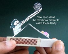 a person is holding a matchbox with a girl on it and the words now open close to the matchbox drawer to catch the butterfly