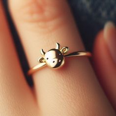 LITHIBITHI - TAMPA, FL - GOLD JEWELRY AND GIFTS ** Dainty Solid Yellow Gold Cow Ring (also available in White and Rose Gold) ** Minimalist design featuring an adorable cow on a 1.5mm wide band ** Perfect for everyday wear or as a thoughtful, nature-inspired gift ** Made with high-quality solid 10k gold (no plating or fillers) ** Beautifully packaged and gift-ready for any special occasion Includes one free resizing with purchase! (within 3 months) Farm Jewelry, Cow Gifts, Ringe Gold, Yellow Gold Rings, Tampa, Rings Statement, Gift For Lover, Solid Gold, Statement Rings