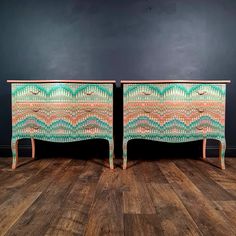 two wooden dressers sitting side by side on top of a hard wood flooring