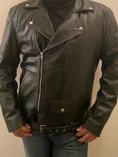 Make the impossible happen! This exclusive leather jacket is the ultimate statement piece for your wardrobe that will add a flare to your style that is timeless but simply modern! Made of the highest quality lambskin leather. M L XL XXL Chest 44 47 50 51 Sleeves 22 1/2 23 23 1/2 24 Length 26 26 26 1/2 28 Leather Long-sleeve Outerwear For Biker Events, Leather Long Sleeve Outerwear For Biker Events, Long Sleeve Leather Outerwear For Biker Events, Biker Style Long Sleeve Leather Jacket, Classic Long Sleeve Leather Jacket For Biker Events, Streetwear Leather Jacket, Jacket Belt, Motorcycle Leather Jacket, Black Motorcycle