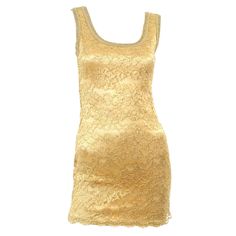 This is a stunning vintage metallic gold stretch lace mini dress from Bergdorf Goodman with the Gruppo GFT label. You can wear this as a mini or style it with a pair of leggings! This designer dress was made in the USA and it is in excellent condition. This bodycon dress is lined, fits a size 2 or a very tight 4 and closes with a back zipper. Tank style bodice with braided trim around the arm holes and neck. Made of metallic fibers and nylon. A perfect party dress! Please review the measurements Embelished Dress, Stretch Lace Dress, Velvet Evening Dress, Silk Evening Dress, Gold Lame, Flapper Style, Lace Bodycon, Rhinestone Dress, Gold Silk