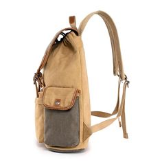 The Mountain Wood Backpack is perfect for an adventure-packed day or school day. Handcrafted using durable cotton canvas, genuine leather accents and nickle-free hardware..Material- vegetable base dyes, interior cotton lining, cotton canvas, genuine leather accents, hardware- alloy, or solid brass, copper.Small sized bag, 12' W x 18' H x 5' D.Handle drop- 3', strap drop- 24'.Drawstring closure.Interior- 1 padded laptop compartment with secure strap, 1 zipper pocket, 2 slip pockets, 2 pen or pencil slots.Exterior- 1 zipper pocket, 2 snap button pockets with flap, silver-tone.Weight- 1lb.Laptop compatible (std. size 13'-15').Clean your bag thoroughly before storing it, use a damp cloth for the exterior and brush out any dirt that has accumulated in the interior.Once your handbag is cleaned, Casual Standard Backpack Canvas Bag, Beige Canvas Backpack, Canvas Backpack With Pockets For Daily Use, Canvas Backpack With Adjustable Strap, Practical Canvas Backpack With Pockets, Casual Brown Waxed Canvas Bag, Casual Beige Cotton Backpack, Canvas Backpack For Outdoor Activities With Pockets, Casual Duck Canvas Bags For Outdoor Activities