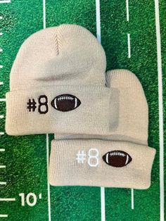 **PLEASE READ SIZING DESCRIPTION  GET READY FOR GAME DAY!  Welcome to our cozy corner of creativity, where warmth meets personal touch! Our Personalized Football Beanie for Toddlers is the perfect accessory to keep your little one warm and stylish all season long. Crafted with love and attention to detail, this adorable beanie is designed especially for infants and toddlers, adding a touch of charm to their winter wardrobe. HOW TO ORDER: 1. Choose your hat color. 2. Then, type the player number Letter Print Beanie Hat One Size Fits Most, White Letter Print Beanie, One Size Fits Most, White Letter Print Beanie (one Size Fits Most), White Beanie With Letter Print, One Size Beanie For Sports Events, One Size Fits Most Beanie For Sports Events, One Size Fits Most Sports Beanie, One Size Fits Most Beanie With Embroidered Logo, Beanie With Embroidered Logo