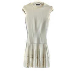 Alexander Mcqueen - Excellent - Cap-Sleeve Knit Cutout Plisse - Cream - Xs - Us 0 - Dress Description Jewel Neckline Cap Sleeves Sheath Silhouette With Curve Contouring Stitching Dropped Waist Hits Past Hips Plisse Pleated Skirt Zipper Up Left Side Retail: $670 Measurements Shoulders: 17 In / 43.18 Cm Chest: 15 In / 38.1 Cm Waist: 11.5 In / 29.21 Cm Hip: 13.5 In / 34.29 Cm Length: 35 In / 88.9 Cm Details Made In: Italy Material: Rayon, Polyamide Size: Xs Color: Cream Condition Excellent Light Di Elegant Fitted Knitted Dress, Fitted Knitted Dresses, Fitted Pointelle Knit Dress With Short Sleeves, Fitted Knitted Dress With Crew Neck, Alexander Mcqueen Dresses, Skirt Zipper, Jewel Neckline, Cap Sleeve, Pleated Skirt