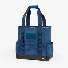 a blue and black tote bag on a white background