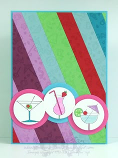 a card with colorful stripes and cocktails on it