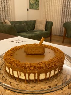 a cake sitting on top of a glass plate