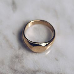 Gold toned brass Small Minimalist Ring in sizes for both men and women. This simple ring has a circular flat face but lot's of style and flat top rings are definitely in right now! Available in 925 Sterling Silver https://etsy.me/2sLAcwj Available in Larger Style https://etsy.me/2CEYcpw Ring Size Available in all sizes. Please be sure to find your exact ring size for the finger you want before ordering. See image chart above or you can use the chart on my website as a guide - https://jewelrylab. Flat Top Ring, Mens Pinky Ring, Ring Minimal, Face Ring, Flat Face, Minimal Ring, Simple Ring, Top Rings, Ring Mens