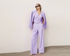 Lilac Palazzo Pants, Wide Leg Pants, Women Pants, Purple Pantsuit, Lavender Set, Wedding Guest Wear, Office Suit, Formal Suit, Anniversary ⭐Size: Please write your chest, waist, hips, height, and we will make a suit to your individual measurements! After you place your order, we may ask you for additional measurements. We do this to ensure that the suit fits you perfectly👌😊 ⭐Our fabric: We have used a premium quality suiting fabric.  ⭐Shipping: ✈️We have two shipping options that we can offer: Lavender Trousers Outfit, Lavender Monochromatic Outfit, Fitted Lavender Pants For Summer, Lavender Fitted Sets For Formal Occasions, Elegant Purple Pants For Summer, Lavendar Suit For Women, Spring Purple Formal Suit, Elegant Fitted Lavender Bottoms, Elegant Purple Summer Pants