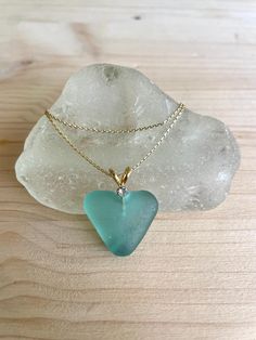 》》》 DESCRIPTION 《《《 This is a beautiful piece of teal beach glass with such a special Shape of heart, set in a sterling silver bail and 45 cm long chain - The sea glass used to make this jewel is 100% genuine and recycled, tumbled by the sea, and it was handpicked by myself in Barcelona beach, in Spain. :) 》》》 PLEASE READ CAREFULLY 《《《 ♡ The item is packaged in a lovely and reusable jewelry box/bag. ♡ All shippings are certified; you'll be able to track the item and see where it is at every mome Turquoise Recycled Glass Jewelry For Jewelry Making, Turquoise Recycled Glass Jewelry For Crafting, Seafoam Sea Glass Jewelry For Gifts, Turquoise Sea Glass Ocean-inspired Jewelry, Green Ocean-inspired Sterling Silver Jewelry, Ocean-inspired Turquoise Sea Glass Jewelry, Teal Beach, Barcelona Beach, Beach Glass Necklace