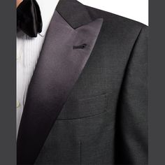 Brunello Cucinelli tuxedo in solid wool-silk blend. Peaked satin lapel; two-button front. Basted sleeves. Three front welt pockets. Double vent. Includes matching flat-front trousers. Virgin wool/silk. Made in Italy. Classic Black Tie Suits With Long Sleeves, Classic Long Sleeve Suits For Black Tie Event, Classic Tuxedo With Lapel Collar For Black Tie, Classic Black Tie Tuxedo With Lapel Collar, Formal Tuxedo Suit With Pressed Crease, Classic Single Button Tuxedo For Formal Events, Single Breasted Tuxedo For Formal Occasions, Classic Semi-formal Tuxedo With Hidden Button Closure, Classic Semi-formal Tuxedo With Hidden Buttons