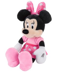 a minnie mouse stuffed animal sitting on top of a white surface with pink and white polka dots