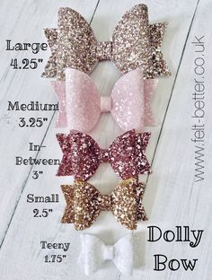 the pink, gold and white glitter bow is shown with measurements for each hair accessory