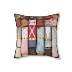 a decorative pillow made out of many different types of dolls on it's sides