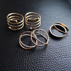 Set of 6 rings. You can choose from 2 colors: gold, silver. Minimalis rings Materials: Alloy Size: one Estimated shipping times United States: 3-5 weeks North America: 3-5 weeks Europe: 9-18 business days I'll do my best to meet these shipping estimates, but cannot guarantee them. Trendy Gold Midi Rings, Trendy Metal Midi Rings For Party, Trendy Rose Gold Metal Rings, Trendy Rose Gold Open Midi Rings, Trendy Rose Gold Rings, Trendy Gold Metal Midi Rings, Trendy Metal Stackable Rings, Minimalist Rose Gold Metal Midi Rings, Gold Stackable Metal Midi Rings