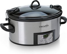 a crock pot with the lid open on an isolated white background, showing the digital display