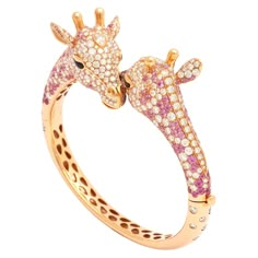 Bracelet giraffe red gold 555 diamonds 16.80 carats 217 pink sapphires 8.20 carats 2 black diamonds 0.49 carats 4 onyx 0.43 carat. Luxury Pink Gold Bracelets As A Gift, Luxury Pink Jewelry With Natural Stones, Luxury Pink Gemstone Jewelry, Luxury Pink Sapphire Fine Jewelry Bracelet, Cool Piercing Ideas, Cute Bracelet Ideas, Cool Piercing, Giraffe Ring, Giraffe Jewelry