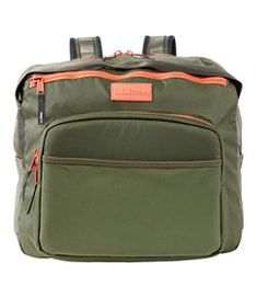 a green backpack with an orange zipper on the front and side pocket, sitting against a white background