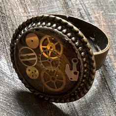 Step into a world of imagination with our unique steampunk ring, a one-of-a-kind piece that fuses vintage aesthetics with modern creativity. Crafted with intricate details, gears, and artistic flair, this ring is perfect for those who appreciate distinctive jewelry. Ideal for everyday wear or as a memorable gift, it's a striking addition to any collection Steampunk Ring, Steampunk Rings, World Of Imagination, Vintage Aesthetics, Christmas Deals, Art Objects, Objet D'art, Memorable Gifts, Intricate Details