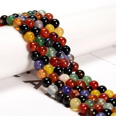 Check out our Coupon Codes Below! Material: Multi-color Agate Shape:  Smooth Round Color:  Multi-Color Size: 6mm  - Approx 67 Beads Per Strand 8mm -  Approx 50 Beads Per Strand 10mm -  Approx 39 Beads Per Strand Hole Size: 1.2mm The Multi-Color Agate Mined in Northeast,China Note: -Gemstone bead sizes are approximate and may have a +/- 0.5mm difference.   -Gemstone bead drill hole sizes are approximate and may have a +/- 0.2mm difference. Use our Coupon Codes for Big Savings! 10% off when you sp Bead Sizes, Diy Gemstone, Gem Show, Sewing Stores, Diy Beads, Jewelry Making Beads, Post Office, Round Beads, Coupon Codes