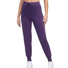 New With Tags Attached The Jack Jogger In Purple Size Small 14 Inches Across The Waistband 28 Inch Inseam Purple, High Waisted Banded Cuffs Drawstring, Elastic Wide Waistband Purple Sweatpants With Elastic Waistband, Purple Athleisure Joggers For Loungewear, Purple Athleisure Sweatpants For Loungewear, Purple Cotton Athleisure Pants, Purple Athleisure Sweatpants With Elastic Waistband, Sporty Purple Loungewear Bottoms, Purple Athleisure Bottoms For Loungewear, Purple Full Length Loungewear Pants, Purple Full Length Athleisure Pants