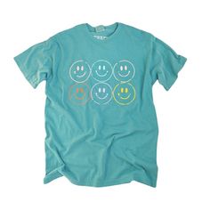 Green Fun T-shirt With Screen Print, Fun Green T-shirt With Screen Print, Fun Cotton T-shirt With Smiley Face, Fun Everyday Short Sleeve T-shirt, Everyday Fun T-shirt With Graphic Print, Blue Retro Shirt With Funny Print, Fun Graphic Print T-shirt For Everyday, Retro Blue Shirt With Funny Print, Playful Relaxed Fit Soft-washed Tops