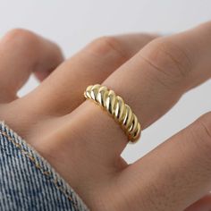 Trendy, and gorgeous croissant/dome ring is the perfect statement accessory! It's super high-quality and looks beautiful on. - - - D E T A I L S - - - * Made of 925 Sterling Silver * We use a THICK, DURABLE 14k Gold or Rhodium plating - for a piece that will last you years to come! * VERY HIGH QUALITY * Available in sizes 4-10 * Ring Width: 6mm * Nickel-Free & Hypoallergenic Ring Sizer- https://www.etsy.com/listing/1240904225/ring-sizer-reusable-ring-sizer-plastic?click_key=b5e074cfb419bcfddc2d9 Layering Diamond Necklaces, Croissant Ring, Rope Ring, Rope Rings, Twisted Ring, Chunky Earrings, Chunky Ring, Dome Ring, Chunky Rings