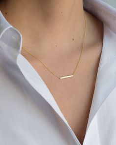 "14K solid gold Bar necklace with a tiny diamond , comes in the gold color of your choice, and length of your choice, dainty and absolutely amazing! The perfect everyday necklace, by itself or layered. made in L.A. Size: Approx. 1\" Diamond: 0.01 ct wt Ships in 5 to 7 business days Comes gift ready in our beautiful branded jewelry box." Simple Bar Necklace With Delicate Chain, Simple Everyday Bar Necklace With Delicate Chain, Minimalist Name Necklace With Delicate Chain, Minimalist Everyday Bar Necklace With Delicate Chain, Everyday 14k Gold Bar Necklace With Delicate Chain, Minimalist Bar Necklace With Delicate Chain, Simple Name Necklace With Delicate Chain, Gold Rectangular Minimalist Name Necklace, Delicate 14k Gold Bar Necklace