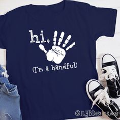 a t - shirt with the words hi i'm a handful on it