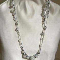 A Beautiful 32 Inches Necklace That Can Be Double Or Triple Wrap Around The Neck For A Different Look Each Time. It Has Clear, Silver, White And Translucent Beads Of All Different Sizes. In Great Vintage Condition. White Necklaces With Colorful Beads For Party, Elegant White Multi-strand Long Necklace, Elegant White Double Strand Long Necklace, Elegant White Long Necklace With Round Beads, White Double Strand Beaded Chain Necklace, White Double Strand Necklace With Beaded Chain, White Pearl Crystal Necklaces For Parties, White Beaded Necklace For Party, White Double Strand Faceted Beads Jewelry