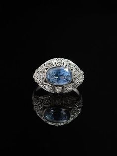 Unforgettable Sapphire was believed to symbolize romantic love, truth and fidelity during past eras and in Roman times it was believed that the sapphire's colour would change or fade accordingly to its owner true feelings.  Proud to present an exceptionally rare 5.47 Ct Ceylon, no-heat, colour change, natural sapphire with 1.83 Ct diamonds in a sophisticated open work ring from Art Deco era.  A world unto itself is encapsulated within this colour change natural sapphire. Upon the first glance th Antique Platinum Ring With Gemstone, Antique Platinum Gemstone Rings, Antique Platinum Rings With Gemstone, Antique Blue Sapphire Ring In Platinum, Vintage Platinum Ring With Gemstone, Vintage Oval Sapphire Ring In Platinum, Antique Blue Brilliant Cut Ring, Antique Blue Platinum Jewelry, Antique Blue Rings With Brilliant Cut