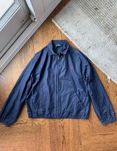 This jacket doesnt look bad on anyone in the world, atleast its a true challenge. This one is from the 1990s and was made in the USA. Condition as shown in photos, there are some signs of wear and it could use a steam. Tagged Medium (Mens) Measurements (In Inches - Laying Flat)  Chest: 25.5 in Length: 25 in Shoulder: 21.5 in Sleeve Length: 24 in As Always: Check all the photos, read the description carefully, and consult the measurements to make sure this piece is right for you. Message me with Luxury Blue Ralph Lauren Outerwear, Polo Ralph Lauren Jacket, Mens Measurements, Ralph Lauren Jacket, Vintage Ralph Lauren, Polo Sport, Jacket Vintage, Flat Chest, Vintage Jacket