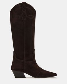 The DOLLIE Western boot offers a sleek and stylish design with a square toe. Experience comfort and durability with every step. Elevate your wardrobe with this timeless and versatile statement piece. 1.75 inch heel height Size 6 measurements: 15 inch shaft circumference, 13 inch shaft height Size 8 measurements: 16 inch shaft circumference, 14 inch shaft height Size 10 measurements: 17 inch shaft circumference, 14.75 inch shaft height Suede upper material Textile and synthetic lining Synthetic s Suede Brown Boots Outfit, Brown Western Boots Outfit, Long Cowboy Boots, Western Boots Outfit, Urban Cowboy, Western Boots Women, Vintage Fits, Western Boot, Golden Girl