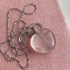 Tender Rose Quartz heart pendant from Madagascar. All crystals are 100% natural and have very soft and tender pink color and some crystal veins. Each crystal is unique and may vary from photo. The chain is very delicate and made of sterling silver filled rhodium, measures 45cm. Comes in luxury gift box and postcard! Rose quartz helps against stress, relieves emotional stress, calmes down, makes your heart spead happiness and love. It removes the pain of old emotional and heart issues.💖 Rose qua Elegant Pink Sterling Silver Crystal Necklace, Pink Sterling Silver Pendant Crystal Necklace, Pink Sterling Silver Crystal Necklace As Gift, Elegant Heart-shaped Clear Necklace, Elegant Clear Heart-shaped Necklace, Elegant Clear Heart Shaped Necklace, Silver Rose Quartz Heart Jewelry, Silver Heart-shaped Rose Quartz Jewelry, Elegant Clear Necklaces For Valentine's Day