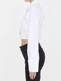 Cropped structured shirt in white organic cotton with boning that runs from the waist to the bust for a sculpting effect. It features classic collar, front button closure and buttoned cuffs. Logo label at the side seam. Fitted cut. The model is 175cm tall and wears size US 6.Size nationality: US Product number: 8316821 Product code: 1WC2241880100 Composition: 100% cotton Platform Wedge Heels, Loafer Sneakers, Logo Label, Premium Brands, Clothes Collection, Cardigan Jacket, Bag Straps, Alexander Wang, Bucket Bag