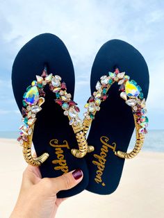 Description The beautiful rhinestone and customizable Flip Flops for the beach brides, bridesmaids, vacation, honeymoon or any occasion you desire to look gorgeous. Perfect in any outfit! Being unique and stunning on design, these flip flops must be your must-have item! The sandal is anti-slip, comfortable and durable as it is made from high quality rubber from the South of Thailand, where is famous for the best rubber tree. Moreover, the crystals are decorated on the sandal with effective adhes Fancy Flip Flops, Bling Flip Flops, Beach Wedding Sandals, Bling Design, Sandals Beach, Rubber Tree, Beach Bride, Rhinestone Sandals, Wedding Sandals