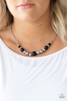 A collection of polished black, classic silver, and crystal-like hematite beads are threaded along an invisible wire below the collar for a glamorous look. Features an adjustable clasp closure. Hematite Crystal, Glamorous Look, Black Bead Necklace, Paparazzi Accessories, Hematite Beads, Black Set, Black Necklace, Paparazzi Jewelry, Short Necklace