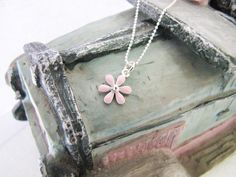 "Lovely enamel flower in pink sterling silver necklace. The chain is a diamond cut chain.   It is ideal gift for your adorable girl.  Made of good quality solid 925 sterling silver; Brand: ANKA; Length: 13, 14, 15, 16 inches available; Pendant: 1*1.6cm; \"925\" stamped; Colour as shown; In Gift Box Packing; Cleaning and polishing with sterling silver cloth after wear  Visit our etsy shop for more kid's sterling silver jewelry and also personalized sterling silver chokers and many other sterling silver everyday jewelry items. https://www.etsy.com/shop/charmplus" Pink Flower-shaped Necklaces For Mother's Day, Sterling Silver Jewelry With Pink Flower Charm, Pink Charm Necklace For Gifts, Dainty Pink Jewelry For Birthday Gift, Pink Flower Pendant Necklace For Mother's Day, Pink Flower Necklace For Mother's Day Gift, Mother's Day Pink Flower Pendant Necklace, Pink Sterling Silver Flower-shaped Jewelry, Pink Flower Charm Pendant Necklace