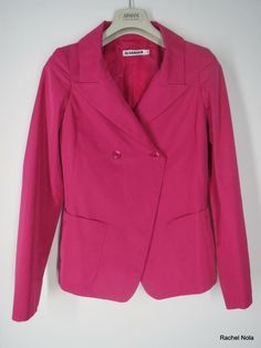 $1200 Jil Sander Blazer Jacket Size 4 34 Pink Cotton Blend Double Breasted Work Luxury designer jacket from JIL SANDER.  *Fabric: Poly-cotton blend.  Lined in 100% silk. *Color: Bright hot pink/magenta/fuchsia.  *Double-notch collar.  *Sleek, single row double-breasted design.  *Princess shaping seams.  *2 front patch pockets (with pocket openings at top & side of the pockets with top-stitching detail).  *Back slit.  *Curved hem.  *Condi Designer Jacket, Notch Collar, Jacket Design, Jil Sander, Pink Cotton, Top Stitching, Sanders, Luxury Designer, Double Breasted