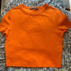 Orange Zara Crop Top Size - Medium New Without Tags 98% Cotton Basic Orange Tops For Summer, Zara T-shirt For Spring, Basic Zara Tops, Zara Crew Neck Crop Top For Summer, Zara Spring Tops, Basic Zara Tops For Spring, Basic Zara Tops For Summer, Trendy Orange Crew Neck Top, Casual Orange Plain Tops